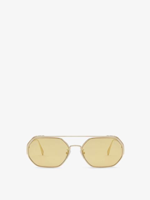 Sunglasses with gold-mirrored lenses