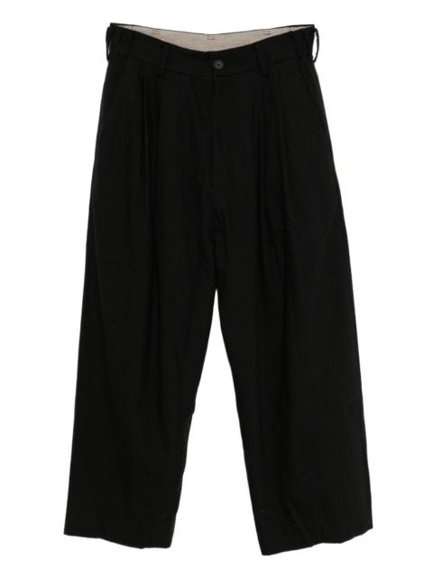 front-pleated trousers