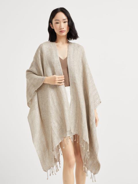 Striped sparkling linen poncho with fringe