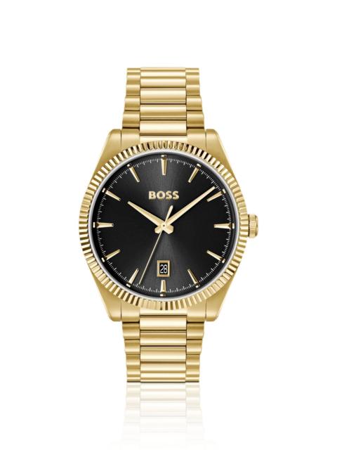 CHESWICK GOLD-TONE WATCH WITH FLUTED BEZEL