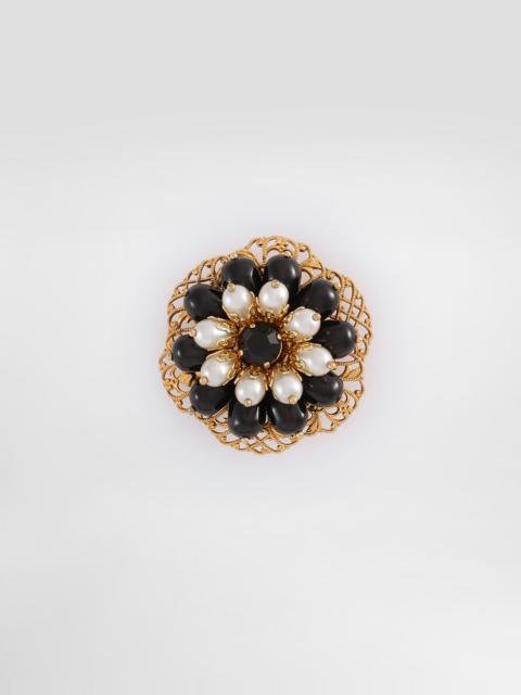 Metal brooch with rhinestones