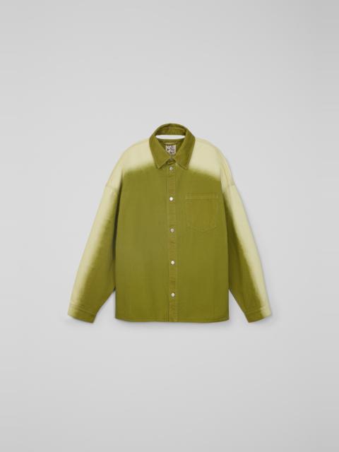 Green denim shirt with printed spray effect