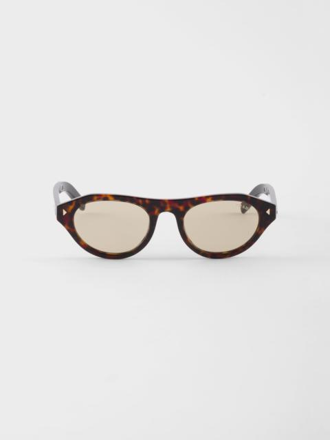 Prada sunglasses with the iconic metal plaque