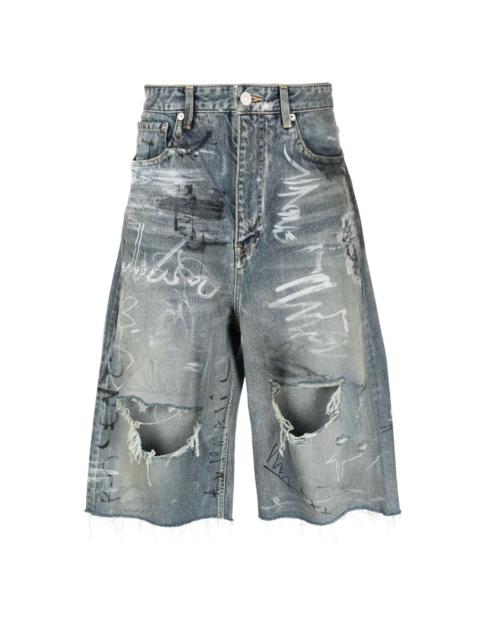 Baggy graffiti-print denim shorts