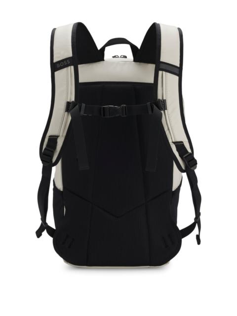 FAUX-LEATHER BACKPACK WITH REFLECTIVE DETAILS