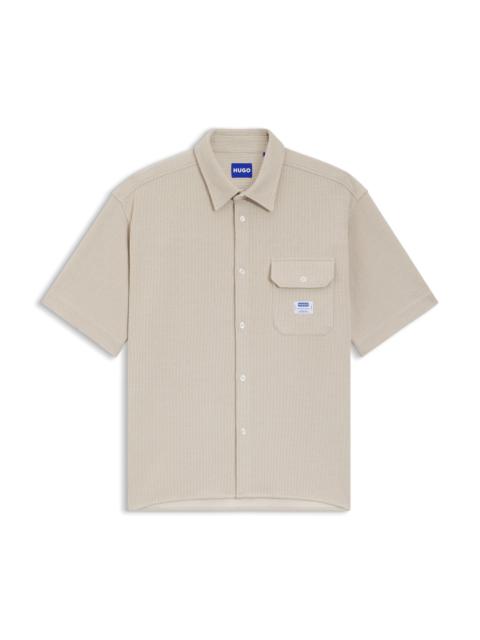 RELAXED-FIT SHIRT IN A WAFFLE-STRUCTURED COTTON