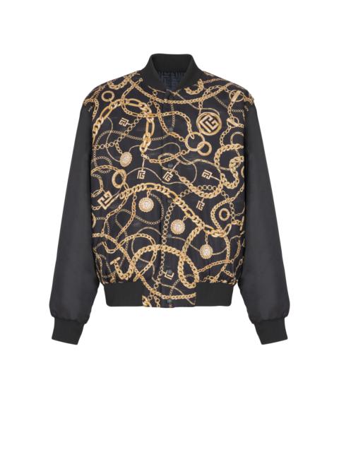 Reversible printed bomber jacket with Chaînes pattern