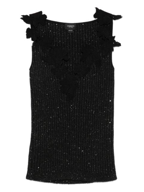 floral-motif embellished top