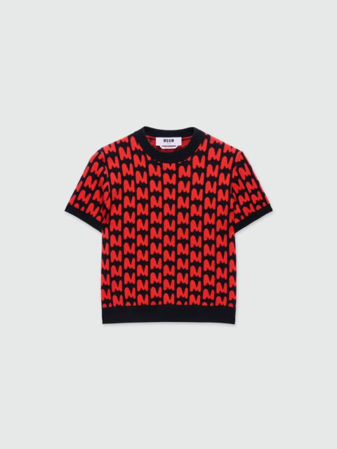 Black short-sleeved jacquard sweater with "TheMwave" motif