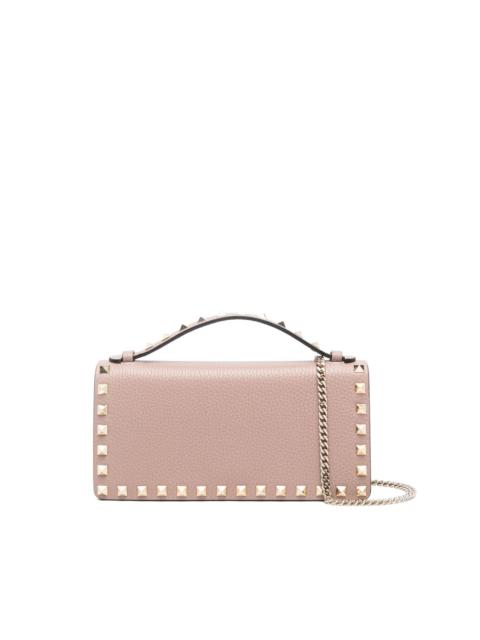 Rockstud-embellished clutch bag