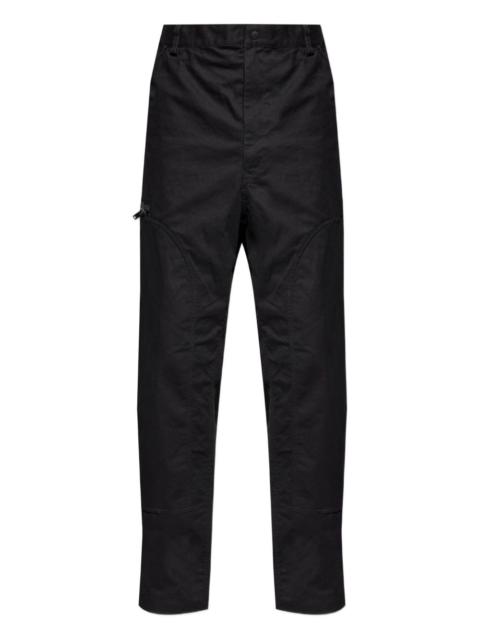 buckle-fastening panelled trousers