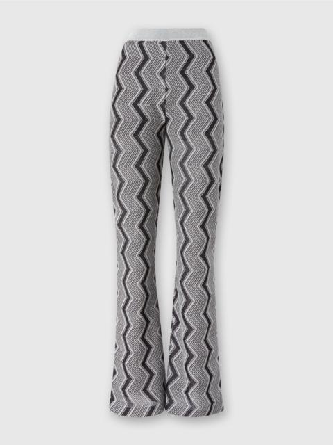 Flare trousers in zig zag lamé viscose