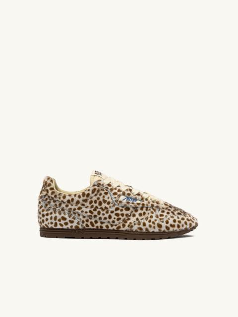WINDSPIN SNEAKERS IN ANIMAL PRINT PONY HAIR EFFECT