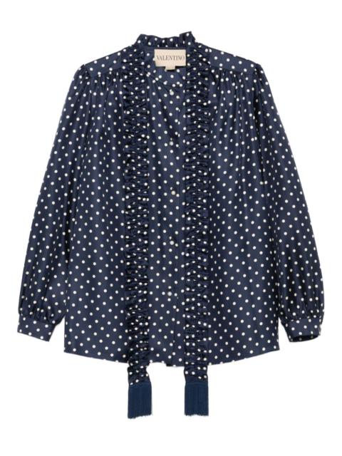 polka-dot ruffled shirt