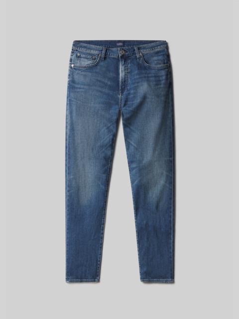 London Tapered Slim Tropical Denim
In Milestone
