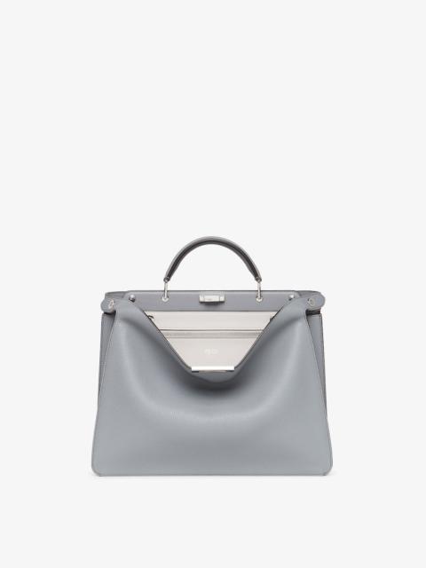 Medium iconic Peekaboo ISeeU bag, made of gray Cuoio Romano leather. The interior is organized into 