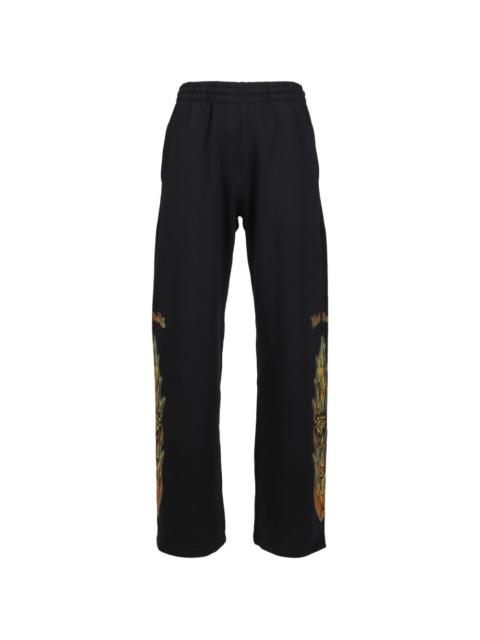 flame-graphic track pants