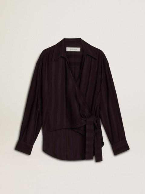 Women's black shirt with vertical stripes and side knot closure