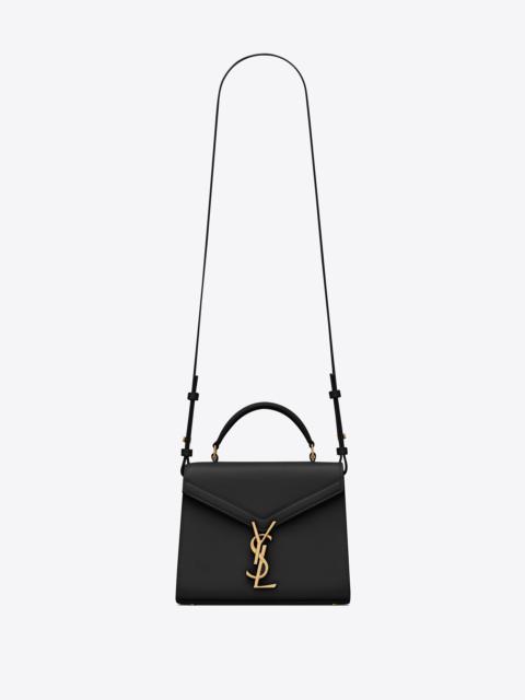 cassandra mini top handle bag in grain de poudre embossed leather