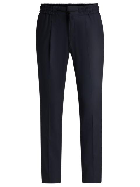 SLIM-FIT TROUSERS IN WOOL