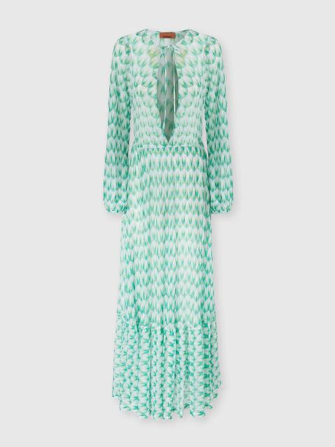 Cover-up in viscose with floral pattern and long sleeves