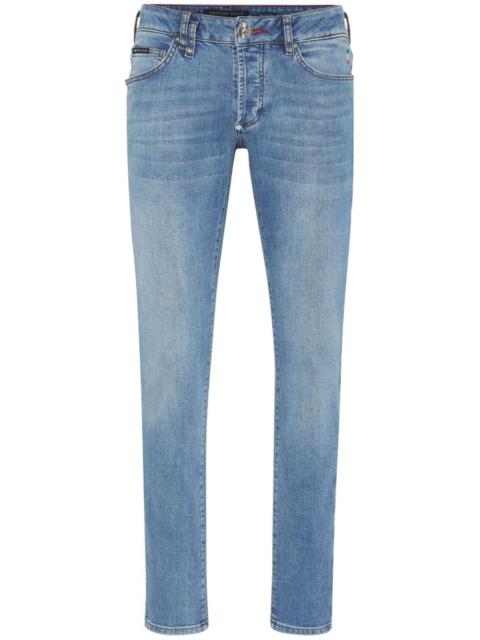 low-rise slim-fit tapered jeans