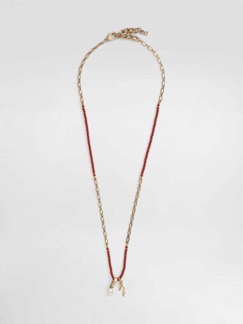 Metal necklace with gemstones and charms