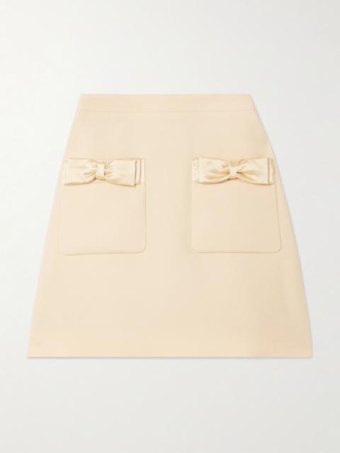 Bow-detailed wool and silk-blend mini skirt Cream