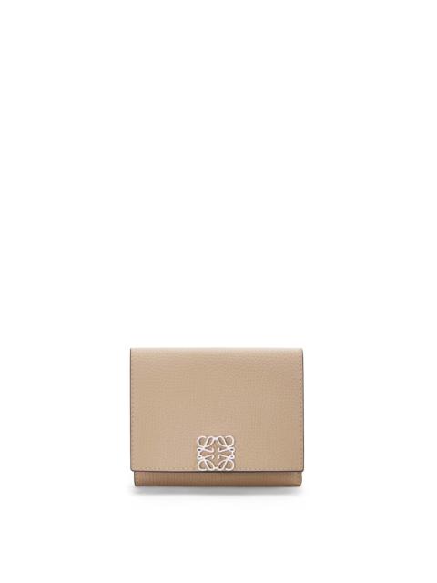 Anagram trifold wallet in pebble grain calfskin
