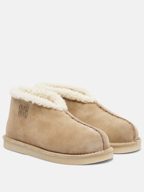 Shearling-lined suede ankle boots
