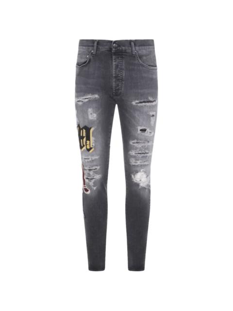 ripped patch skinny jeans