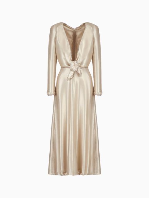 Long dress with embroideries and floral embellishment