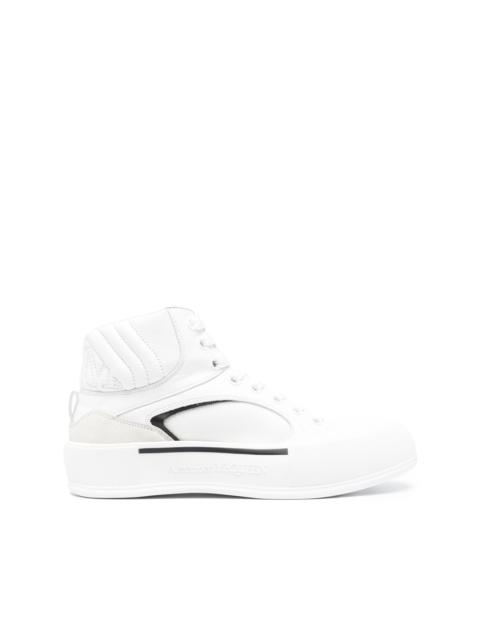 Seal-embroidered leather sneakers