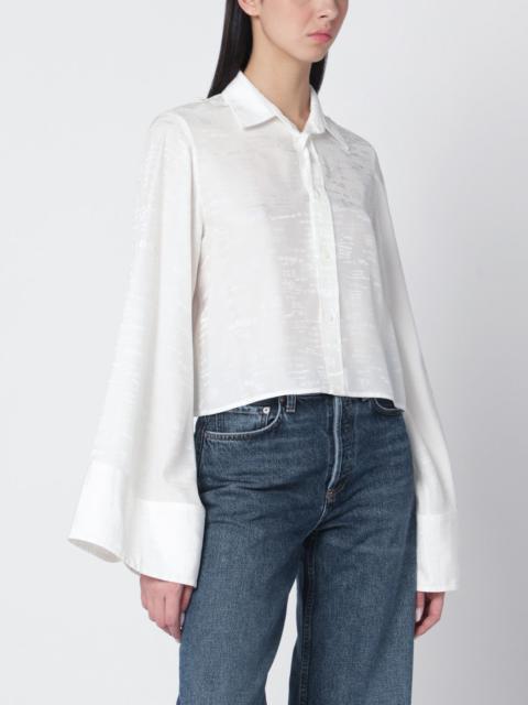 White shirt with all-over logo graphic