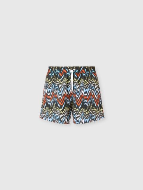 Mid-length swim shorts with abstract zigzag print