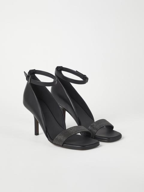 Matte calfskin heels with precious strap detail