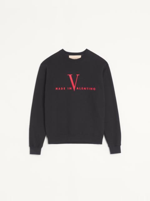 VALENTINO COTTON CREWNECK SWEATSHIRT WITH MADE IN VALENTINO PRINT