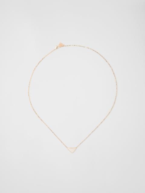 Eternal Gold micro triangle pendant necklace in yellow gold and diamonds