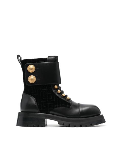 embossed-button detail ankle boots