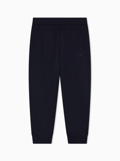 Double-jersey joggers with embossed embroidered EA logo