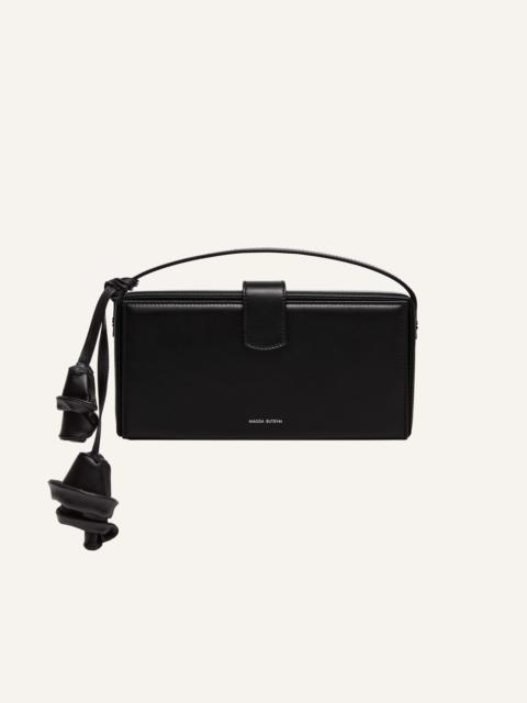 Apolonia bag in black leather with flower charm