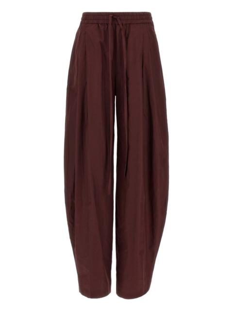 pleated tapered trousers