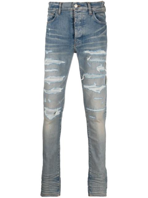distressed-effect skinny jeans