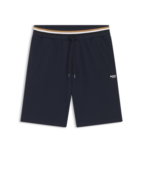 LOGO-PRINT SHORTS IN COTTON TERRY