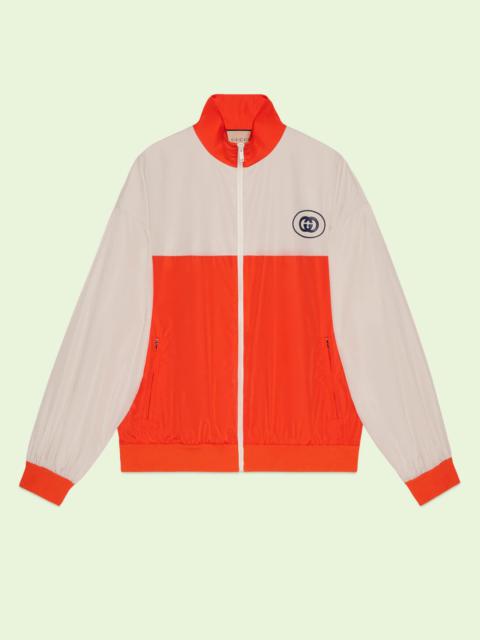 Polyester zip jacket with 'Gucci' print