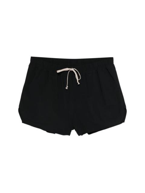 DRAWSTRING-FASTENING SWIM SHORTS