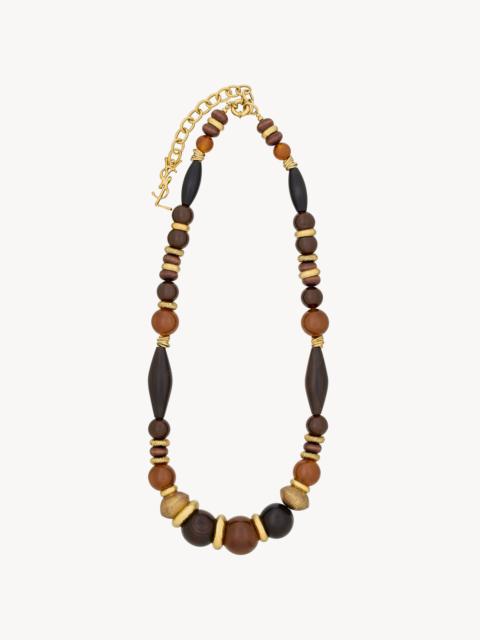 OVERSIZED NECKLACE IN GLASS, WOOD, RESIN, AND METAL