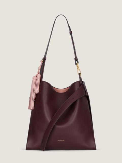 MEDIUM BELTED HOBO BAG IN LEATHER