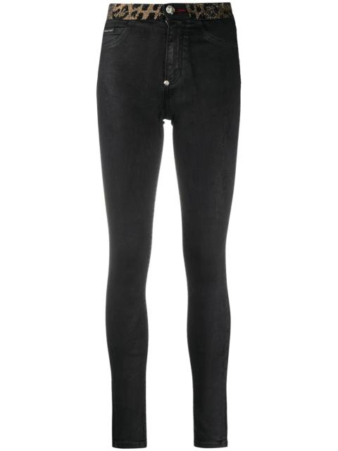 leopard-trimmed skinny jeans