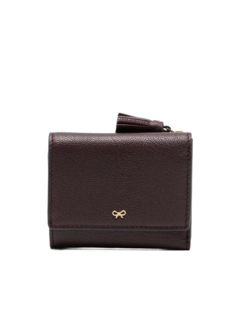 peeping-eyestassel trifold leather wallet